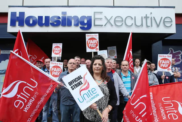 Unite  trade union members outside the Housing Executive, protest at a range of issues including pay and pensions in 2014. Picture by Brian Little/Presseye