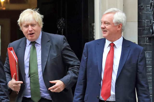 Boris Johnson, then Foreign Secretary and now Prime Minister, and David Davis who has urged Boris Johnson to resign, telling the Prime Minister at PMQs "in the name of God go".