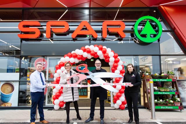 Colin Cunningham, Helen and Gavan Wall and Emma Morrow from The Wall Group officially declare the £3m Landscape Filling Station SPAR NI store open on the Crumlin Road, Belfast