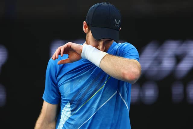 MELBOURNE, AUSTRALIA - JANUARY 20: Andy Murray of Great Britain reacts in his second round singles match against Taro Daniel of Japan during day four of the 2022 Australian Open at Melbourne Park on January 20, 2022 in Melbourne, Australia. (Photo by Clive Brunskill/Getty Images)