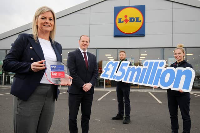 Economy Minister Gordon Lyons, Maeve McCleane, director of human resources at Lidl Ireland & Northern Ireland, Lidl Dundonald duty manager Matthew Blair and customer assistant Faye Harvey