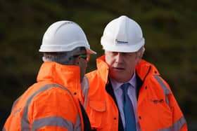 Prime Minister Boris Johnson during a visit to Hanson Aggregates in Penmaenmawr, North Wales. Picture date: Thursday January 27, 2022.