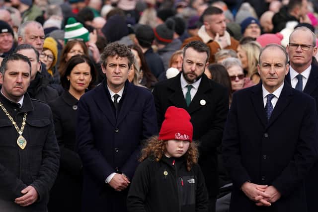 Colum Eastwood (centre with beard) along with taoiseach Micheal Martin (front right) and other senior Irish political figures at the Bloody Sunday 50th anniversary commemoration on Sunday.