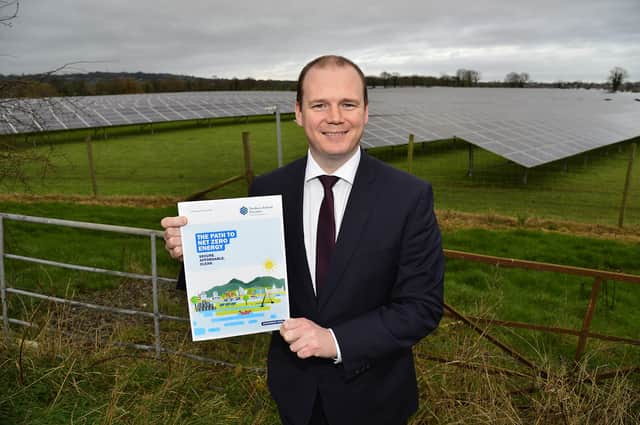 Economy Minister Gordon Lyons launches The Path to Net Zero Energy at a solar farm near Lisburn