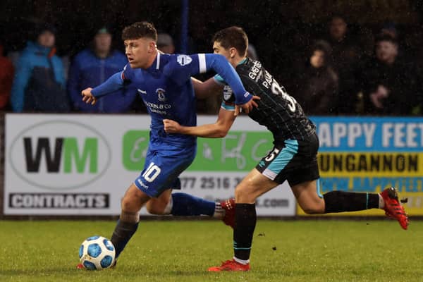 Oisin Smyth (left) on show for Dungannon Swifts. The Northern Ireland under 21 international has signed for Oxford United. Pic by PressEyeLtd.