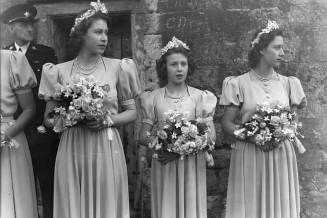 The then 20-year-old Princess Elizabeth (left), bridesmaid at the wedding of Hon. Patricia Mountbatten and Lord Brabourne in 1946.