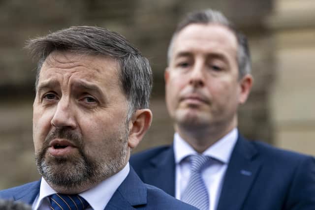 Health Minister Robin Swann (left) was seeking legal advice after Paul Givan (right) resigned as first minister