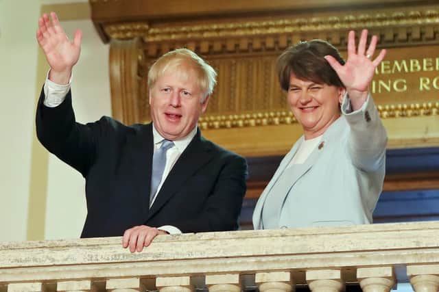 Boris Johnson with Arlene Foster at Stormont in summer 2019. Weeks later she called his initial regulatory Irish Sea border plan a “serious and sensible way forward”