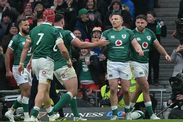 DUBLIN, IRELAND - FEBRUARY 05: Andrew Conway of Ireland celebrates with team mates after scoring his second try of the game during the Guinness Six Nations match between Ireland and Wales at Aviva Stadium on February 05, 2022 in Dublin, Ireland. (Photo by Charles McQuillan/Getty Images)