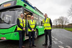 Mr Lyons with Neil Collins, Wrightbus Managing Director (right) and Mid and East Antrim Mayor Councillor William McCaughey (left)