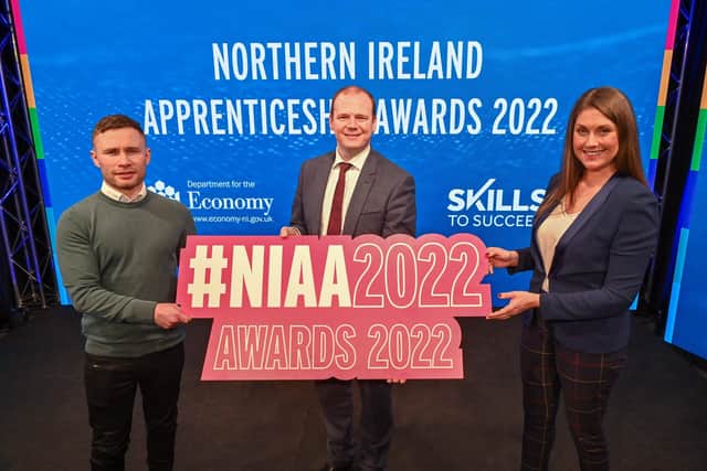 Pictured with Economy Minister Gordon Lyons at the virtual NI Apprenticeship Awards 2022 awards ceremony are local presenter and ceremony compere Sarah Travers with former two-weight world champion boxer Carl Frampton