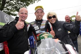 Ryan Farquhar and his wife Karen celebrate Peter Hickman's third place on the KMR Kawasaki in the Lightweight TT in 2017.