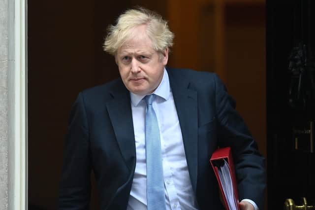 Prime Minister Boris Johnson leaves 10 Downing Street, London, to attend Prime Minister's Questions on Wednesday. PA image