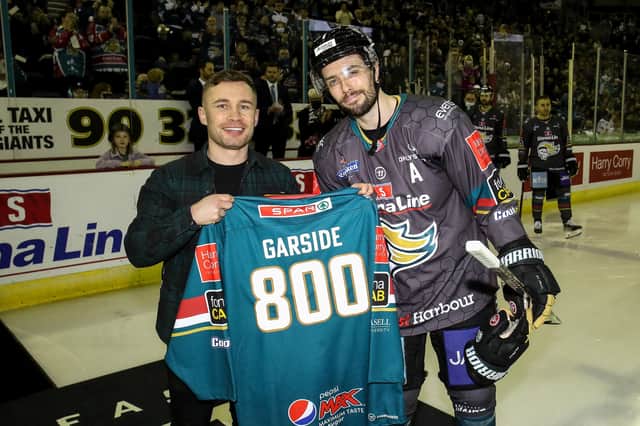 Carl Frampton presents Mark Garside with a jersey on his 800th game ahead of last Saturday’s fixture in Belfast. He is only the seventh player in league history to make this milestone