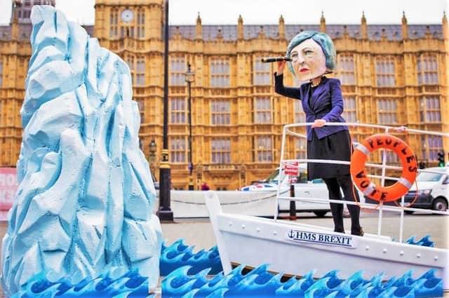 An anti-Brexit mock-up of Theresa May steering the good ship Brexit into an iceberg outside the Palace of Westminster; Owen Polley argues that many people have misunderstood the reality of Mrs May’s Brexit deal