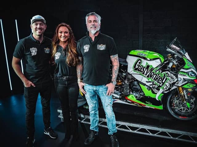 Peter Hickman with FHO Racing team team owner Faye Ho and Richard Rawlings of Gas Monkey Garage with the BMW M1000RR Hickman will race at this year's Isle of Man TT races.