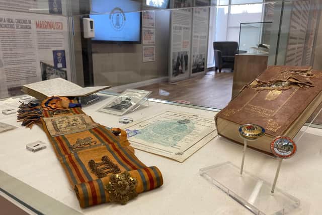 Orange sashes and a biography of the key Reformation figure William Tyndale with a bullet hole in it has gone on display