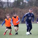 Keith Gillespie at Armagh City Football Club with young players Pauric McShane, Shae McManus, Enda Smyth and Aodhn Carson