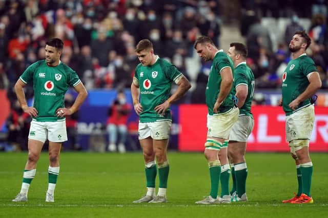 Ireland players appear dejected after the final whistle of the Guinness Six Nations match at the Stade de France, Paris. Pic by PA.