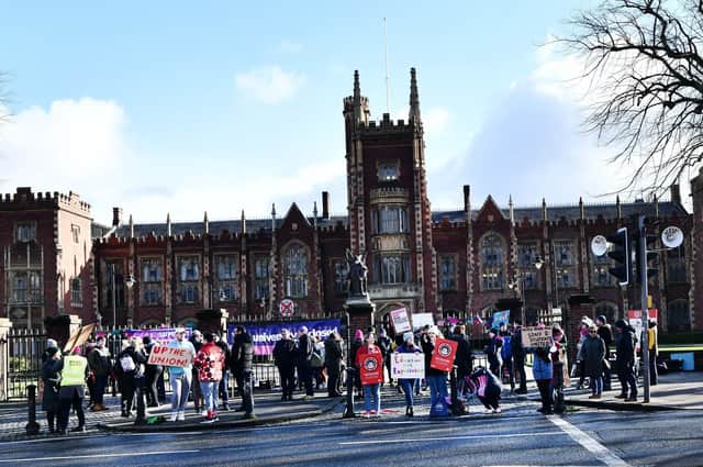 Protesters at Queen's University on Monday demand a better deal for lecturers.
 Pic Colm Lenaghan/ Pacemaker