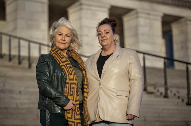 Margaret McGuckin (left) and Denise Burke of Survivors and Victims of Institutional Abuse (SAVIA) on the steps of Parliament Buildings at Stormont