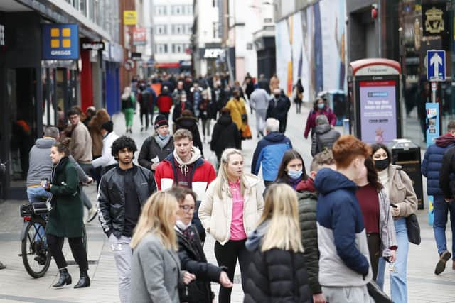 Shoppers go about their business in Belfast City Centre as Coronavirus legal restrictions are being lifted in Northern Ireland and being replaced with guidance