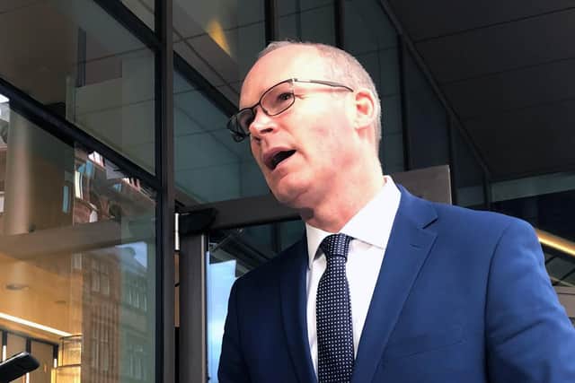 Irish Foreign Affairs Minister Simon Coveney speaking to media on a previous visit to Belfast.