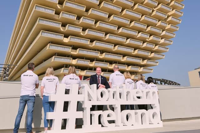 Economy Minister Gordon Lyons with some of the volunteers at the UK Pavilion on Northern Ireland Day at Expo 2020 in Dubai