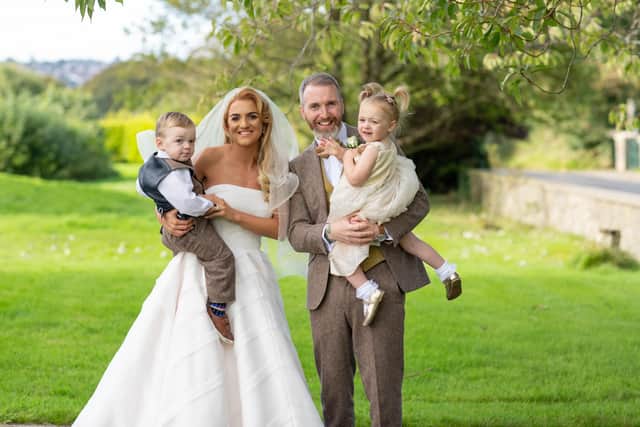 Bronagh Burke with her late husband Thomas and their children on their wedding day