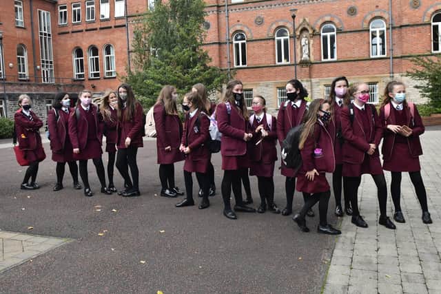 Pupils at St Dominic's grammar school, like other post-primary schools in NI, have been strongly advised to continue wearing face masks. Pic Colm Lenaghan/Pacemaker