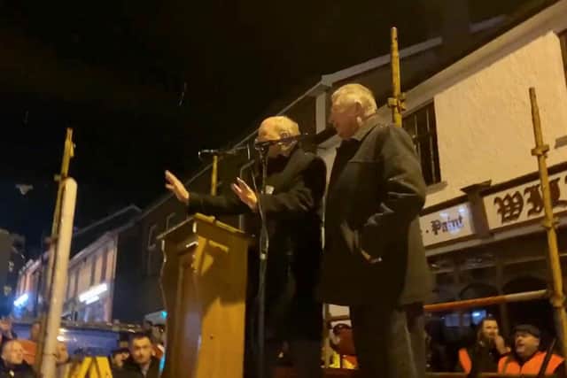 TUV leader Jim Allister (left) intervenes during a speech by DUP MP Sammy Wilson at an anti-NI Protocol rally in Markethill, Co Armagh to appeal to the crowds to stop booing him.