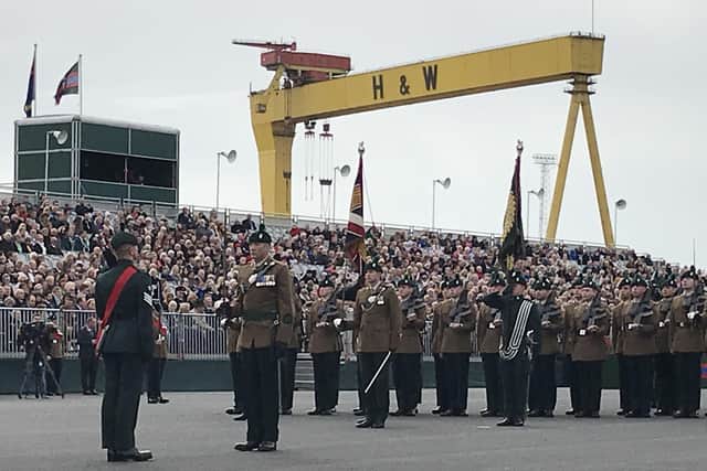 Two Royal Irish Regiment receiving their new colours on the Titanic Slipways in Belfast. The regiment have finally laid their old Regimental Colours to rest in Co Fermanagh where the regiment was originally raised in 1689, after a gap between the two events caused by the coronavirus pandemic.  Photo: Rebecca Black/PA Wire