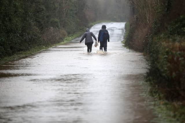 The Moyola River burst its banks yesterday, flooding the Clooney Road and Island Road, making them impassable. Fields around Tobermore flooded. Photograph by Declan Roughan / Press Eye