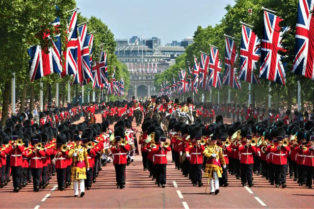 A parade makes its way up The Mall from Horse Guards Parade to Buckingham Palace, central London, following a previous Trooping the Colour ceremony on the Queen's birthday