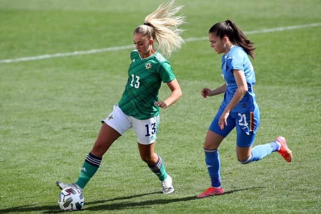 Northern Ireland's Danielle Maxwell with Romania's Ana Vladulescu during Wednesday's international friendly at the Marbella Football Centre, Spain. Photo by William Cherry/Presseye.