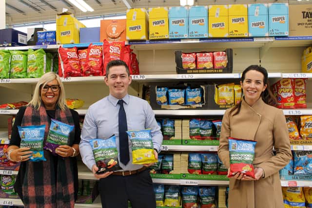 Mary McKillop, director, Glens of Antrim Crisps and Amy Stewart, sales manager, Glens of Antrim Crisps are pictured with Michael Crealey, Tesco buying manager for NI