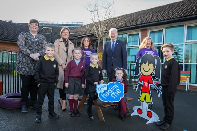 (L-R) Lynsey Stewart, principal of Ligoniel Primary School, Nicola McKeown, acting vice-principal of Christ the Redeemer Primary School, with Action Mental Health’s Our Generation team member Rebecca Mitchell, AMH chief executive David Babington and AMH Our Generation team member Laura Euler, were joined by the children of Ligoniel Primary School and Christ the Redeemer Primary School for the launch of a brand new mental health and wellbeing programme for children from P1 to P4, Little Healthy Me