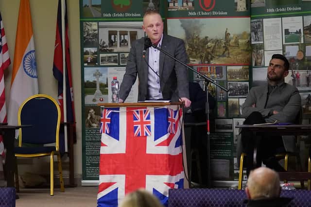 Jamie Bryson (centre) takes part in a rally against the Northern Ireland Protocol at Carlton Street Orange Hall, Portadown, in County Armagh, Northern Ireland. Picture date: Wednesday February 23, 2022.