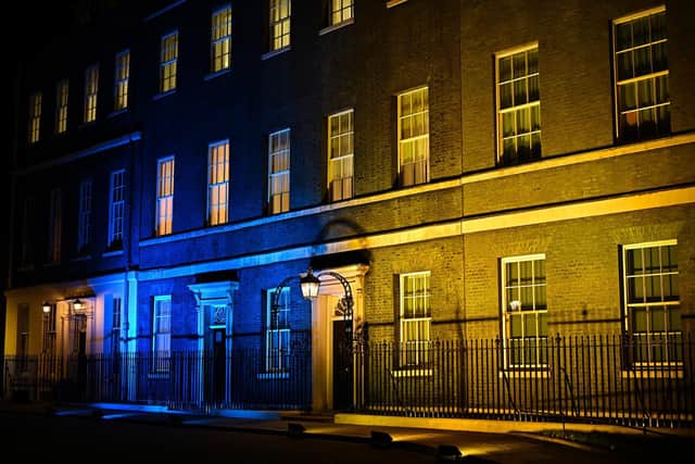 Downing Street lights up in the colours of the Ukrainian flag as a sign of solidarity.