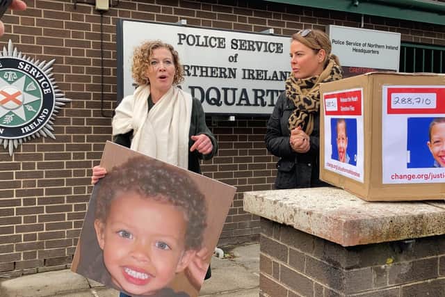 Ms Donohoe, accompanied by her sister Niamh, delivers a petition to police headquarters on Friday. Fiona Donohoe the mother of Noah Donohoe, a 14-year-old pupil at St Malachy's College in Belfast, was found dead in a storm drain in the north of the city in June 2020, six days after he went missing.
