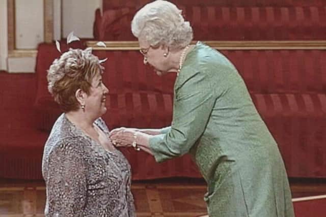 The Larne-born actress and grandmother-of-three receives her MBE from the Queen for services to theatre and comedy in 2006