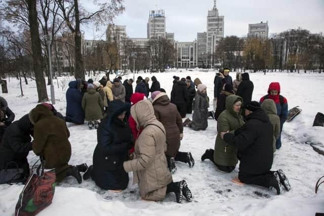 Christians praying in Kharkov city