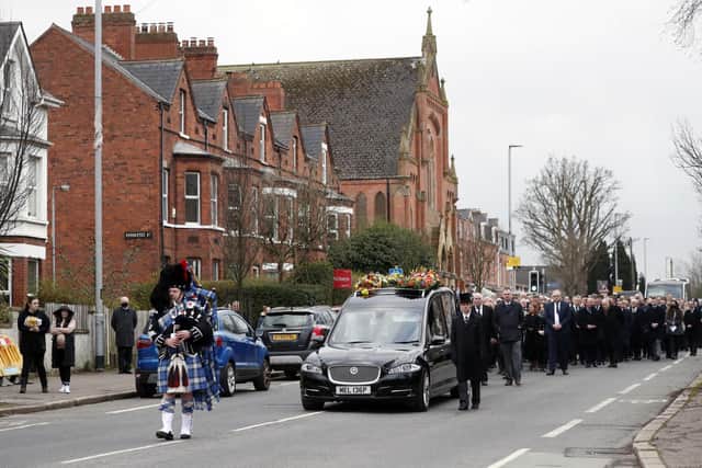 DUP MLA Christopher Stalford's funeral cortege makes its way along Ravenhill Road to a service at Presbyterian Church, Belfast. The 39-year-old father of four, who was principal deputy speaker of the Stormont Assembly, died suddenly on February 19. Picture date: Saturday February 26, 2022.