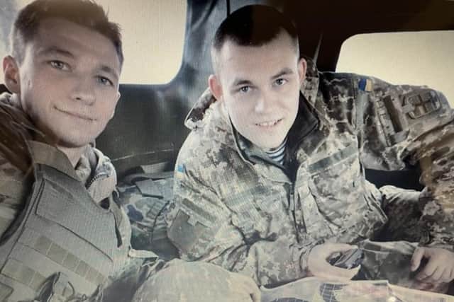 Ryan (left) training marines in Mykoliaiv