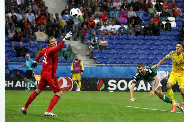 Gareth McAuley scores against Ukraine in France in 2016. In following NI, Owen Polley has visited Donetsk. He has also been to Crimea and Russia. Presseye/William Cherry