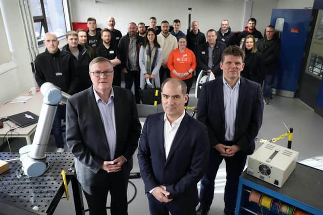 William Ussher, CforC senior executive, Laith Dajani, executive director and Dr David Paulson, Professor of practice and programme director, are pictured with students of the Advanced Manufacturing Leadership Programme