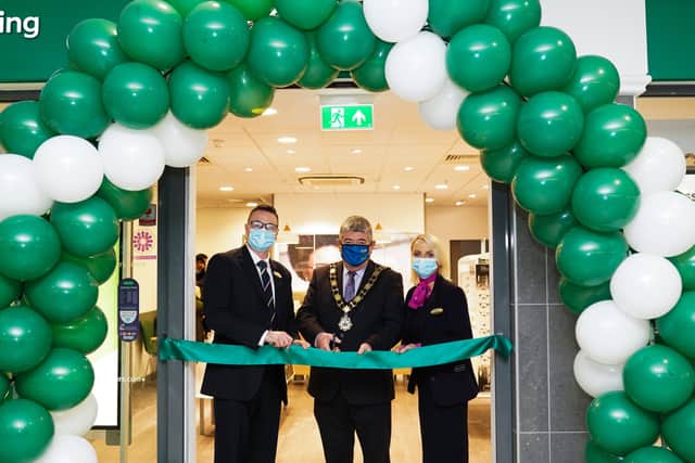Specsavers Antrim director Davin Quinn and store manager Ita Armour are joined by The Mayor of Antrim and Newtownabbey, Councillor Billy Webb to officially open the new-look store