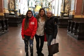 Alina (centre) with her sister Oksana and niece Anna in 2017 in Poland, the last time she has met them in person