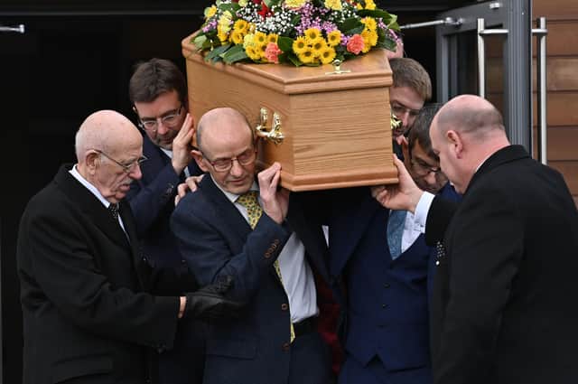 Andy Cardy (Husband)  carries the coffin with family and Friends during Patricia Cardy's funeral at Hillsborough Elim Church on Thursday..
 Photo Colm Lenaghan/ Pacemaker Press