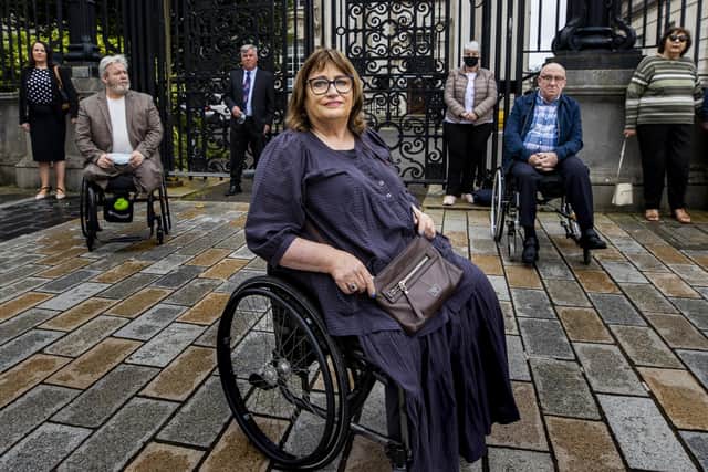 Belfast bomb victim Jennifer McNern (centre)  outside Belfast's High Court with with legal team and members of the Wave Trauma Centre in support. Photo: Liam McBurney/PA Wire